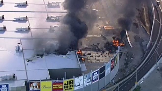 Light plane crashes into Melbourne shopping complex